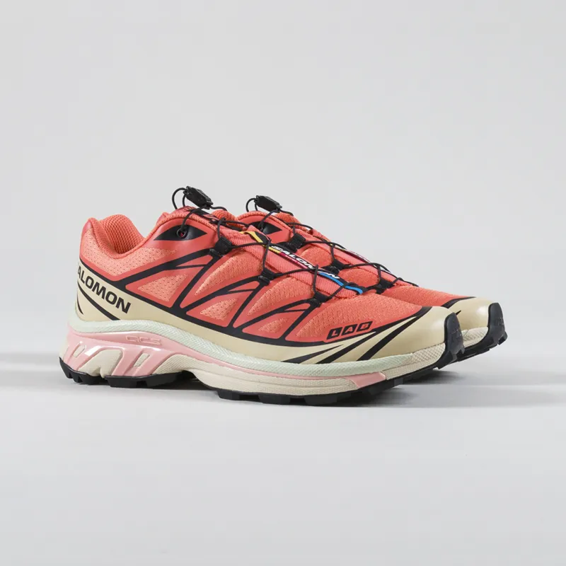 Pink salomon shoes sales