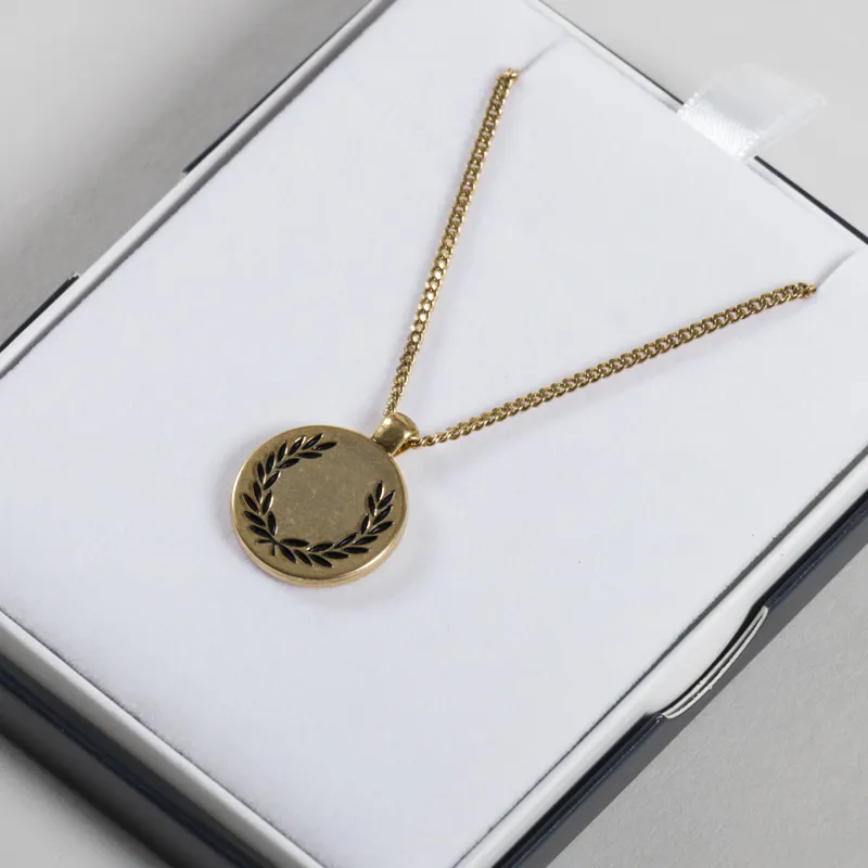 FRED PERRY☆ Laurel Wreath Pendant Necklace GOLD Fred Perry ID Bracelet - Shiny Gold | Accessories | Hats