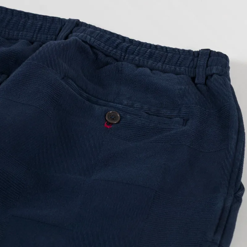 Universal Works Pleated Track Pants Dark Navy Patchwork Weave Cotton-9