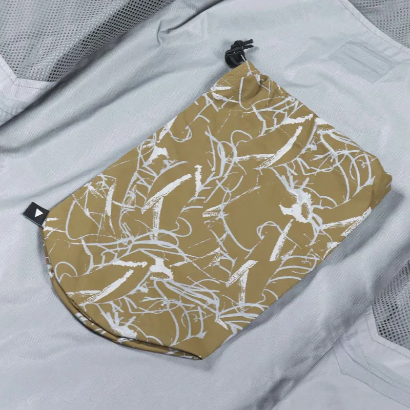 And Wander Mens Technical Reflective Printed Rain Jacket Beige