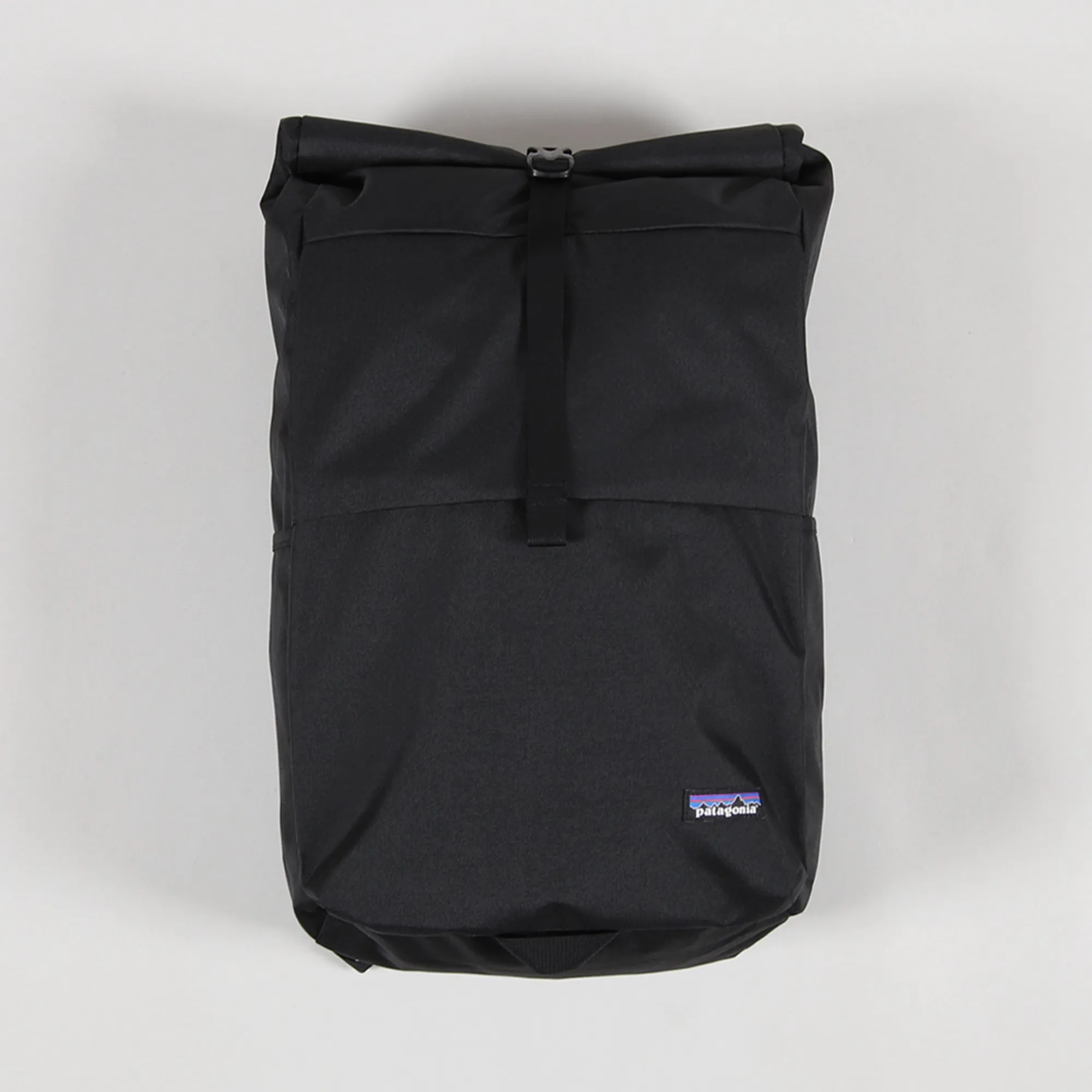 patagonia roll bag Black Hole Wheeled Duffel 70L Aqua Stone lining and webbing Patagonia Stormfront 45L Roll-Top Backpack