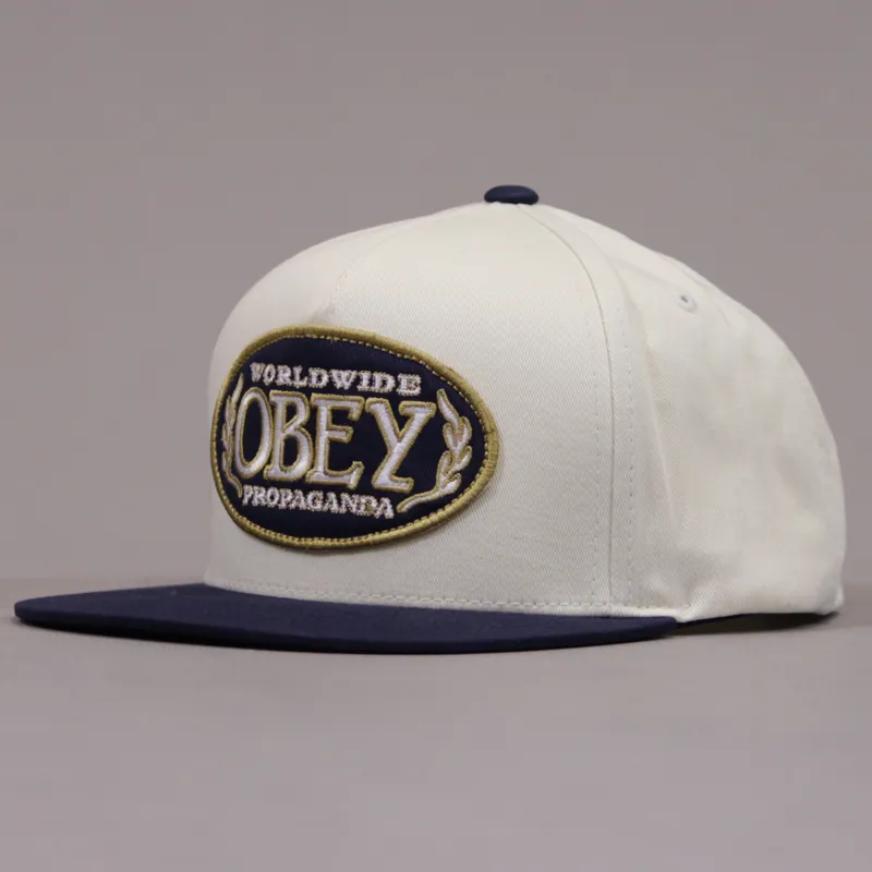 Obey Oval Snapback Cap - Natural and Navy
