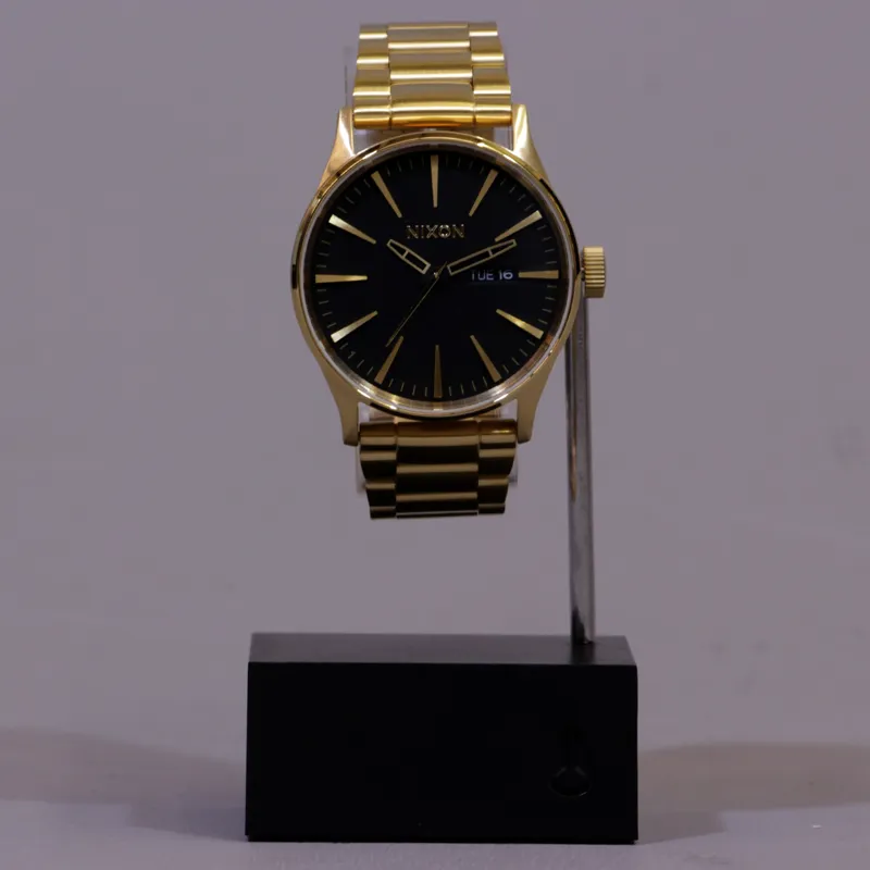 Nixon sentry ss gold black online