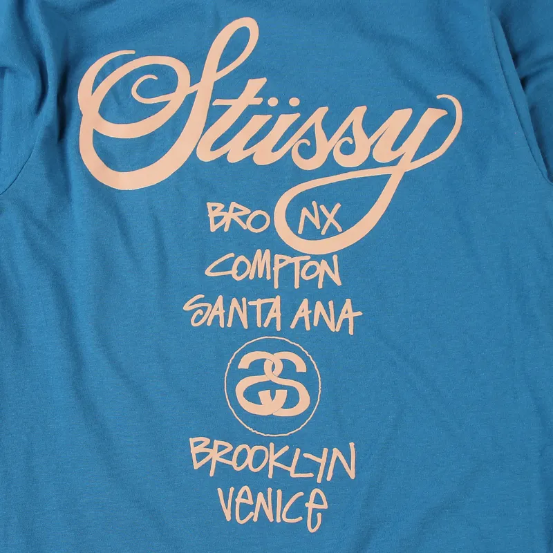 Stussy mens short sleeve blue peach world tour t-shirt